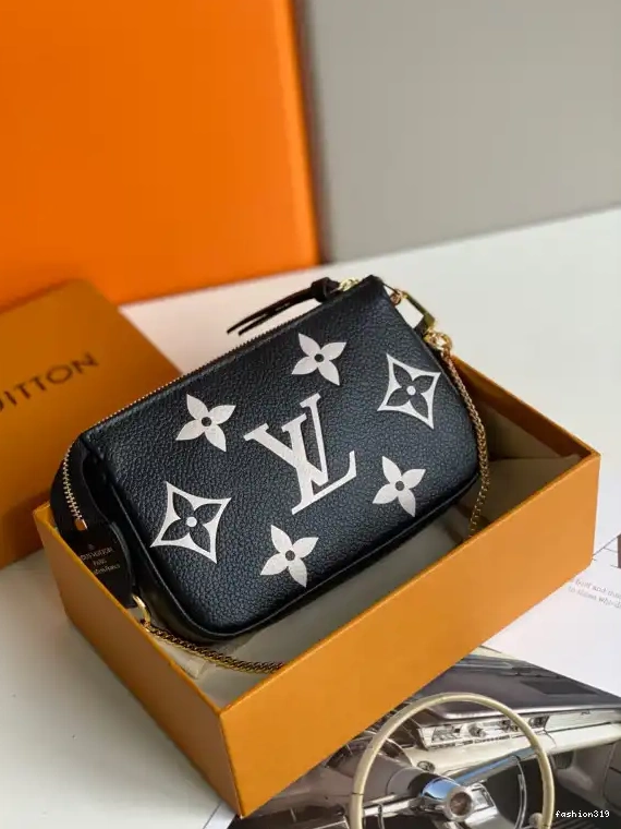 VUITTON POCHETTE ACCESSOIRES LOUIS MINI 0329